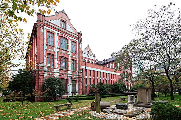 old red-brick building in campus of Shanghai Jiaotong Univeristy